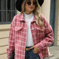 Woman wearing Bella Road Plaid Collared Neck Long Sleeve Jacket with sunglasses and black hat, standing outside a building