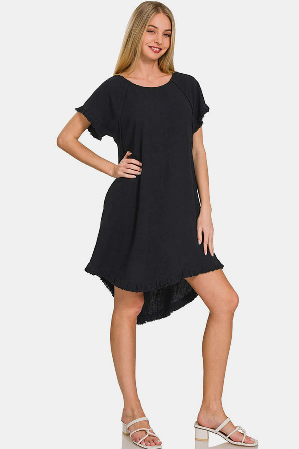 Fringe Edge High Low Flowy Dress with Pockets in black, perfect for adding a bohemian touch to your wardrobe.