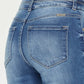 Close-up view of Distressed Raw Hem High Waist Jeans from behind showing distressed details and casual raw hem.