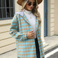 Woman wearing Bella Road Drawstring Plaid Long Sleeve Hooded Jacket paired with jeans, hat, and sunglasses.