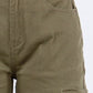 Close-up of olive green high rise cargo pants featuring button details and utility pockets.