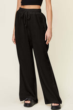 DOUBLE TAKE Full Size Texture Drawstring Wide Leg Pants at Bella Road