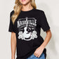 Woman wearing a Graphic Round Neck Short Sleeve T-Shirt with Nashville Country Music print, paired with blue jeans.