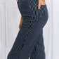 Cassidy full size high waisted tummy control striped straight Judy Blue jeans for women displaying superior waistline smoothing.