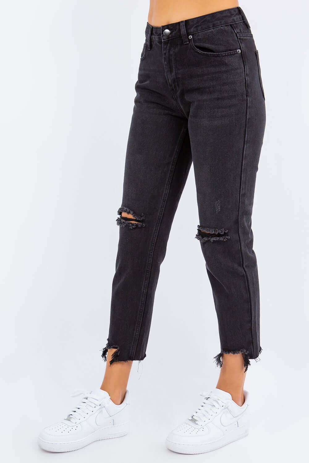 High Waist Distressed Cropped Straight Jeans in black with edgy ripped details, styled with white sneakers for a casual and cool look.