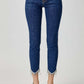 Embellished mid-rise crop skinny jeans with fringe detail, shown on model with clear heels. Fashionable and versatile denim.