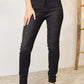 Tummy control high waist denim jeans full size model wearing Judy Blue Jeans with a sleek and flattering silhouette