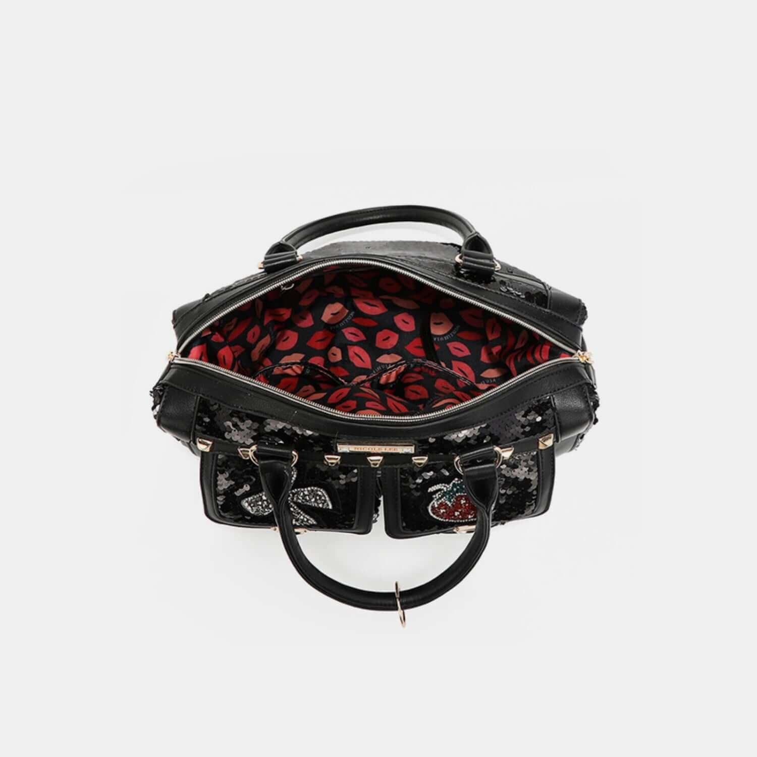 Interior view of Nicole Lee USA Sequin Patch Boston Bag with red lips pattern lining and vegan leather accents