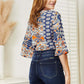 DOUBLE TAKE Tie Hem V-Neck Three-Quarter Sleeve Blouse at Bella Road