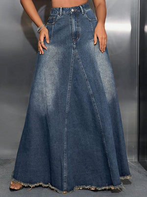 High waist denim skirt with raw hem and pockets for a stylish and functional wardrobe addition.