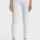 Millennia high-rise white yoga leggings with a wide waistband, perfect for comfortable practice and stylish poses.