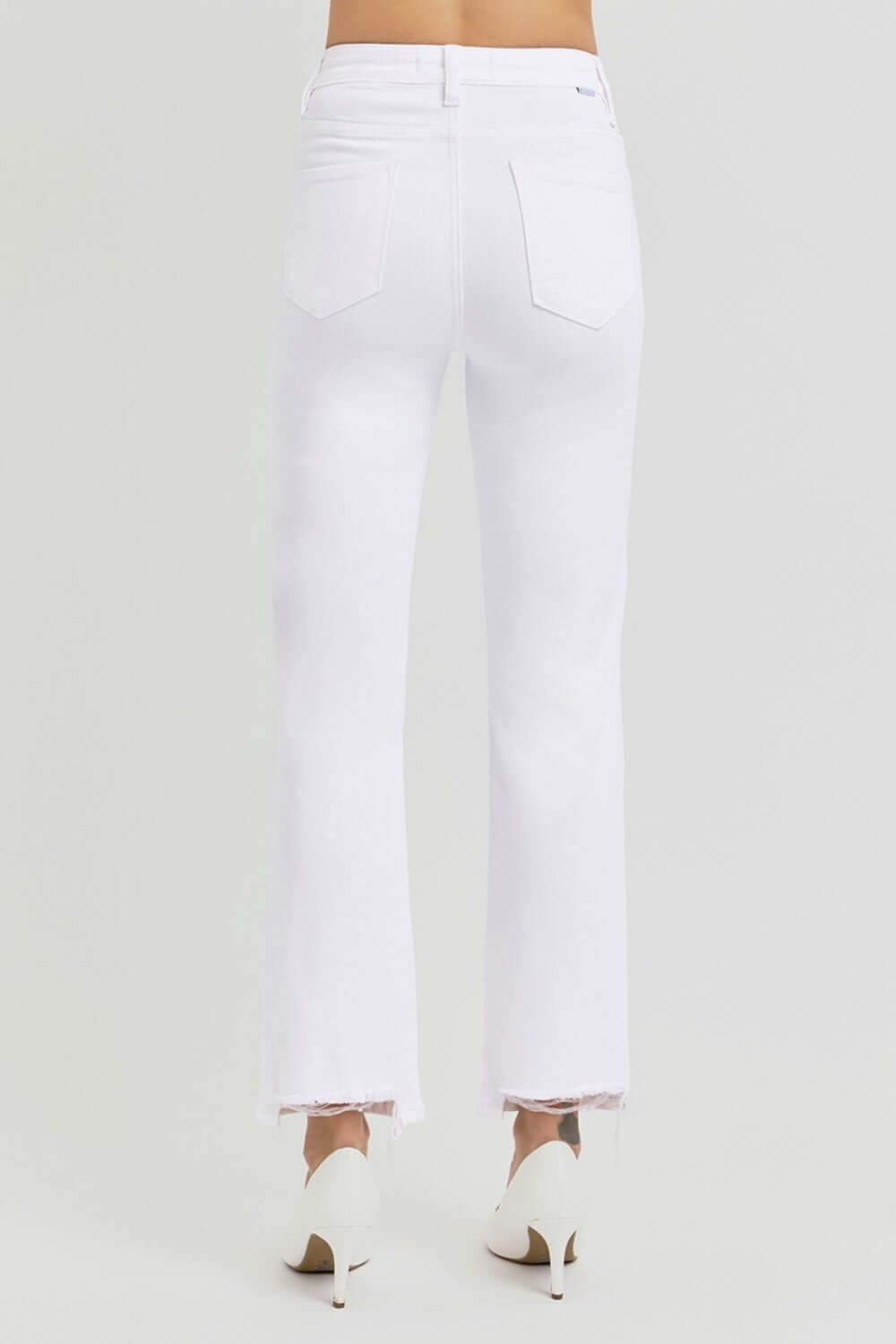 White high rise crop straight jeans with tummy control elastic band, featuring a modern cropped leg and flattering fit from behind.