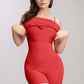 Woman wearing a red shapewear garment demonstrating its fit and sleek design.