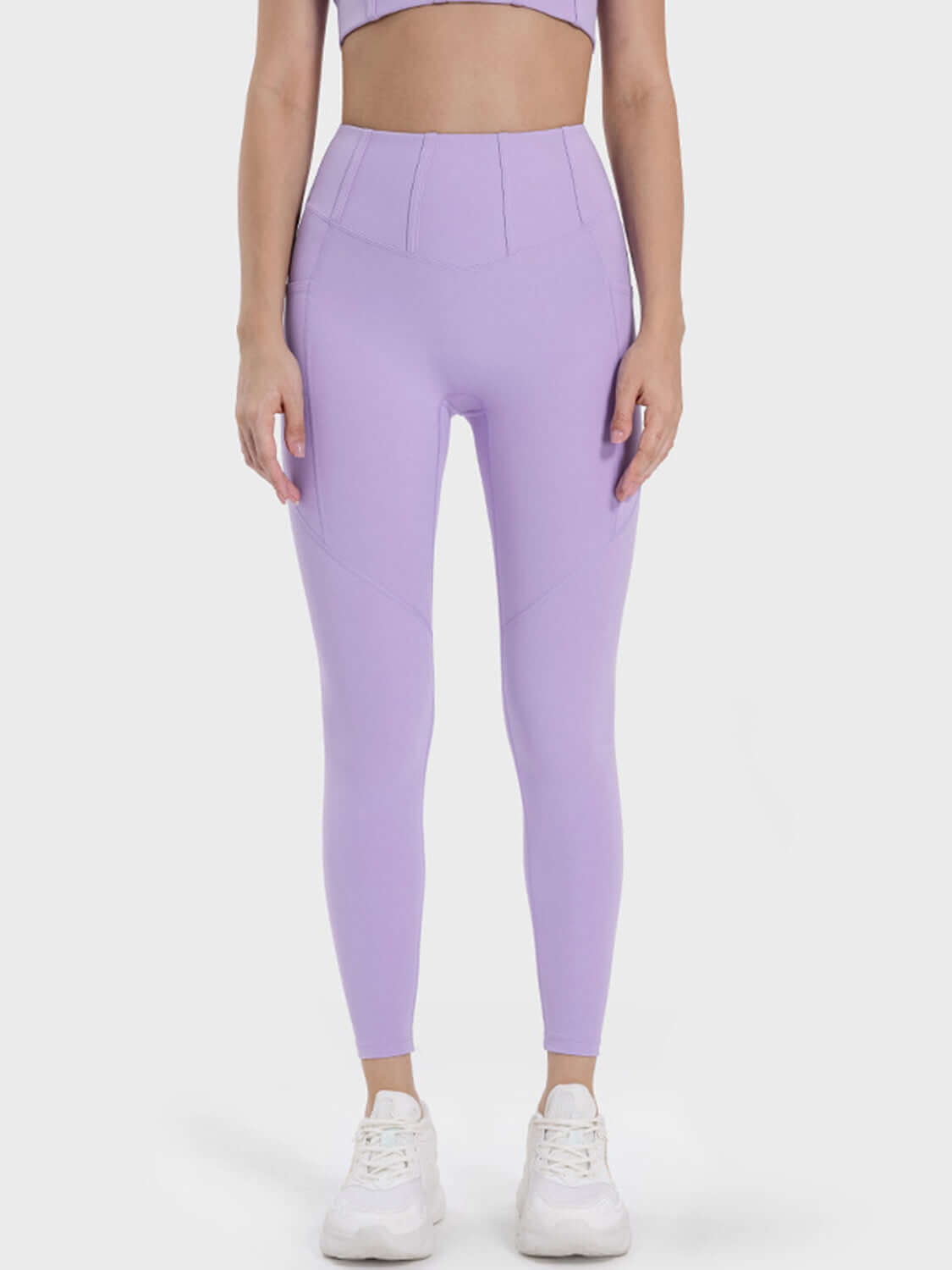 Millennia Pocketed High Waist Active Leggings in lavender, showcasing a stylish and comfortable workout fit.