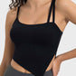 Millennia Slit Asymmetrical Neck Active Cami in black, featuring stylish slit and adjustable straps for workouts.