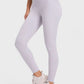 Light gray Millennia yoga leggings with wide waistband, perfect for comfort and flexibility during workouts.