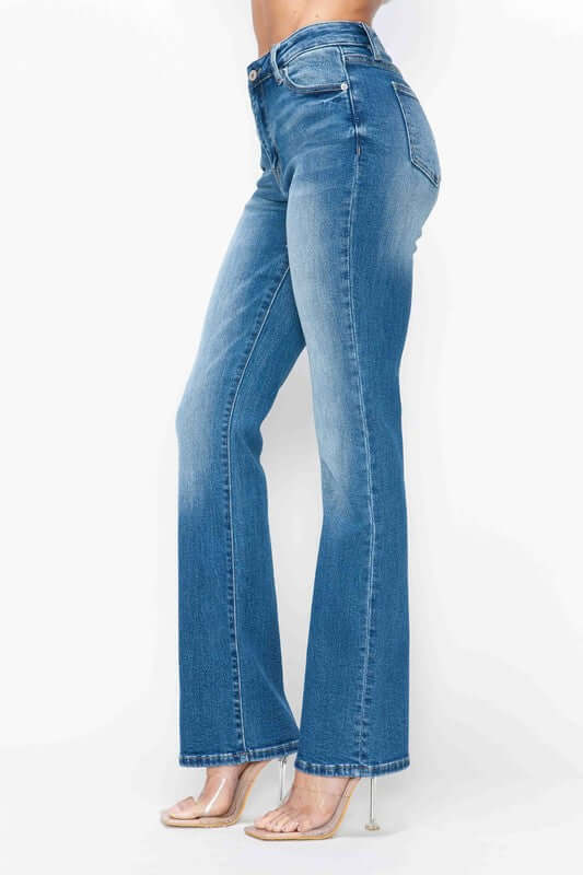 Full size distressed high rise jeans with pockets, featuring a flattering fit and vintage charm.