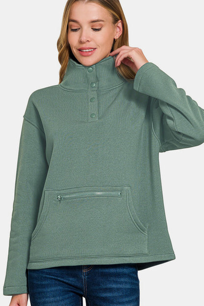 Cozy green fleece sweatshirt with turtleneck and half snap buttons, perfect for chilly days or casual lounging.