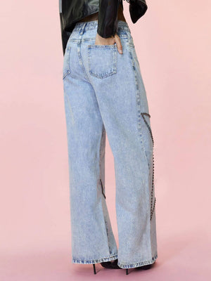 Bella Road Studded Star Straight Jeans with pockets in light blue denim, featuring stylish studded details on a model from the back view.