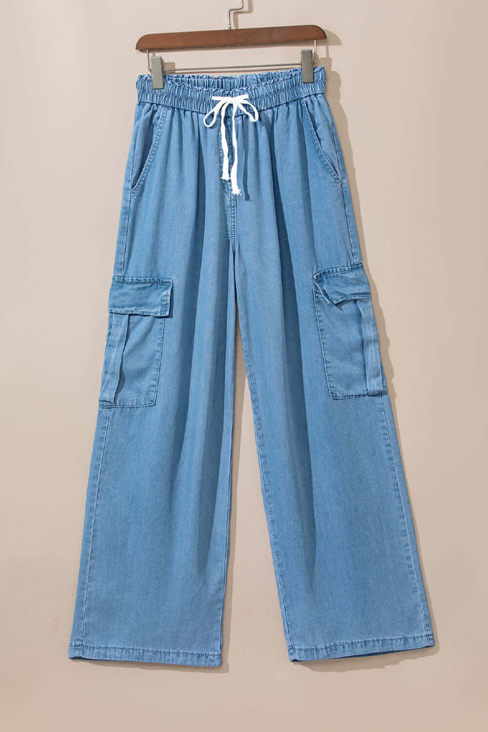 Bella Road light wash wide leg jeans with drawstring and cargo pockets, perfect for casual outings.