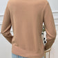 Back view of Devine Lace Detail Heart Long Sleeve Sweater in beige, featuring delicate lace heart detailing and cozy knit texture.