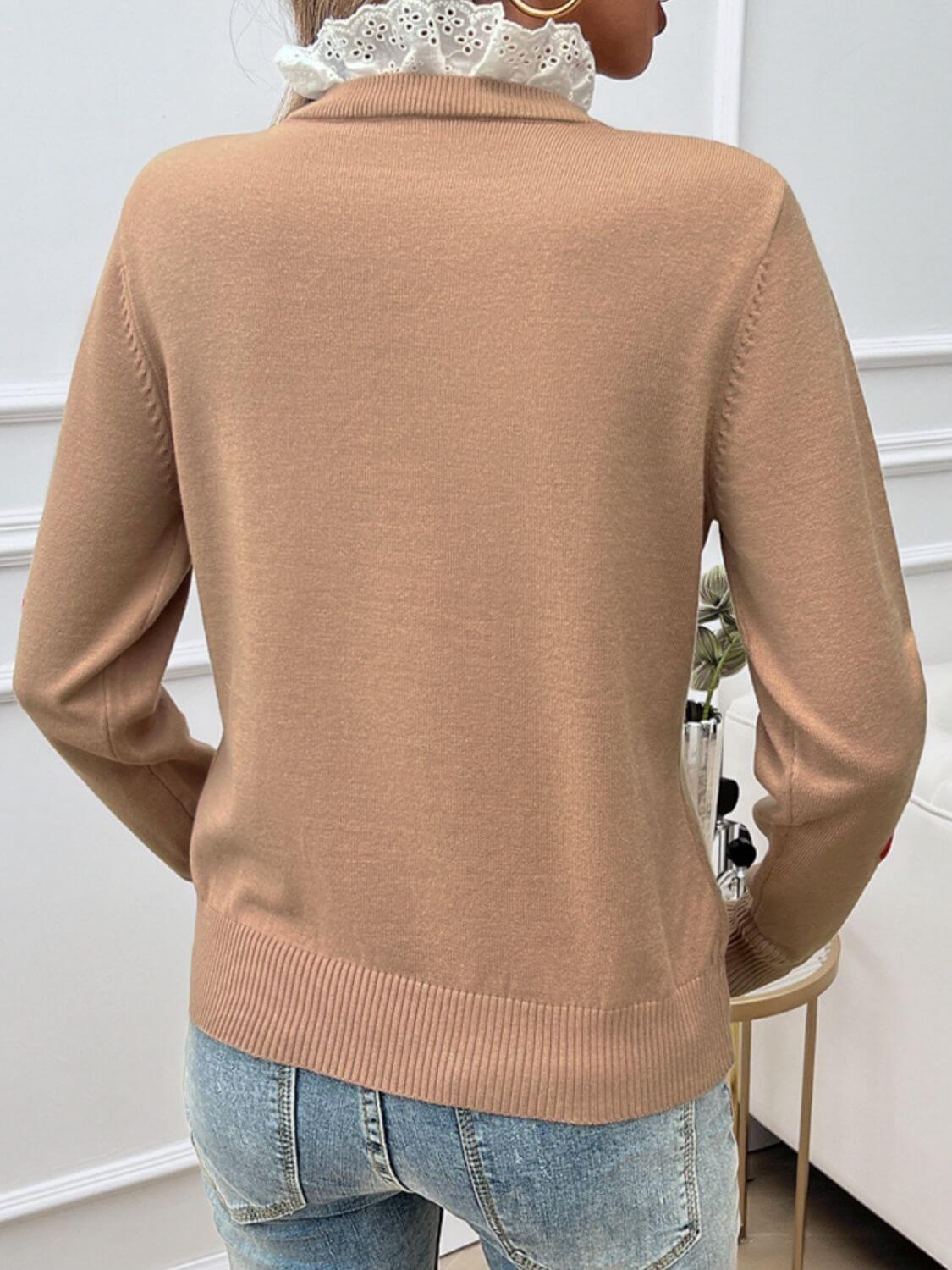 Back view of Devine Lace Detail Heart Long Sleeve Sweater in beige, featuring delicate lace heart detailing and cozy knit texture.