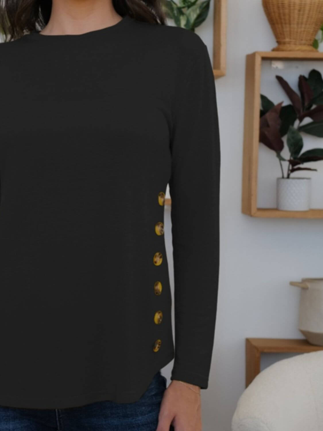 FAM-FAM Round Neck Long Sleeve T-Shirt in black with decorative buttons, perfect for adding playful elegance to any casual outfit.