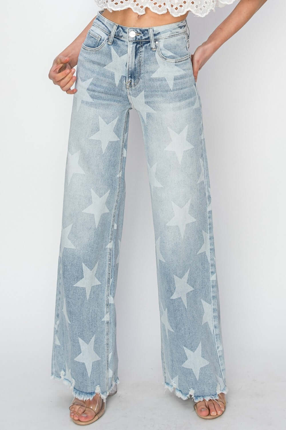 Stylish Risen Jeans full-size star-embellished raw hem wide leg jeans with an edgy and whimsical charm.