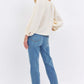 Woman wearing High Waist Straight Judy Blue Jeans with a cream blouse and sandals. Back view showcasing the flattering high waist design.