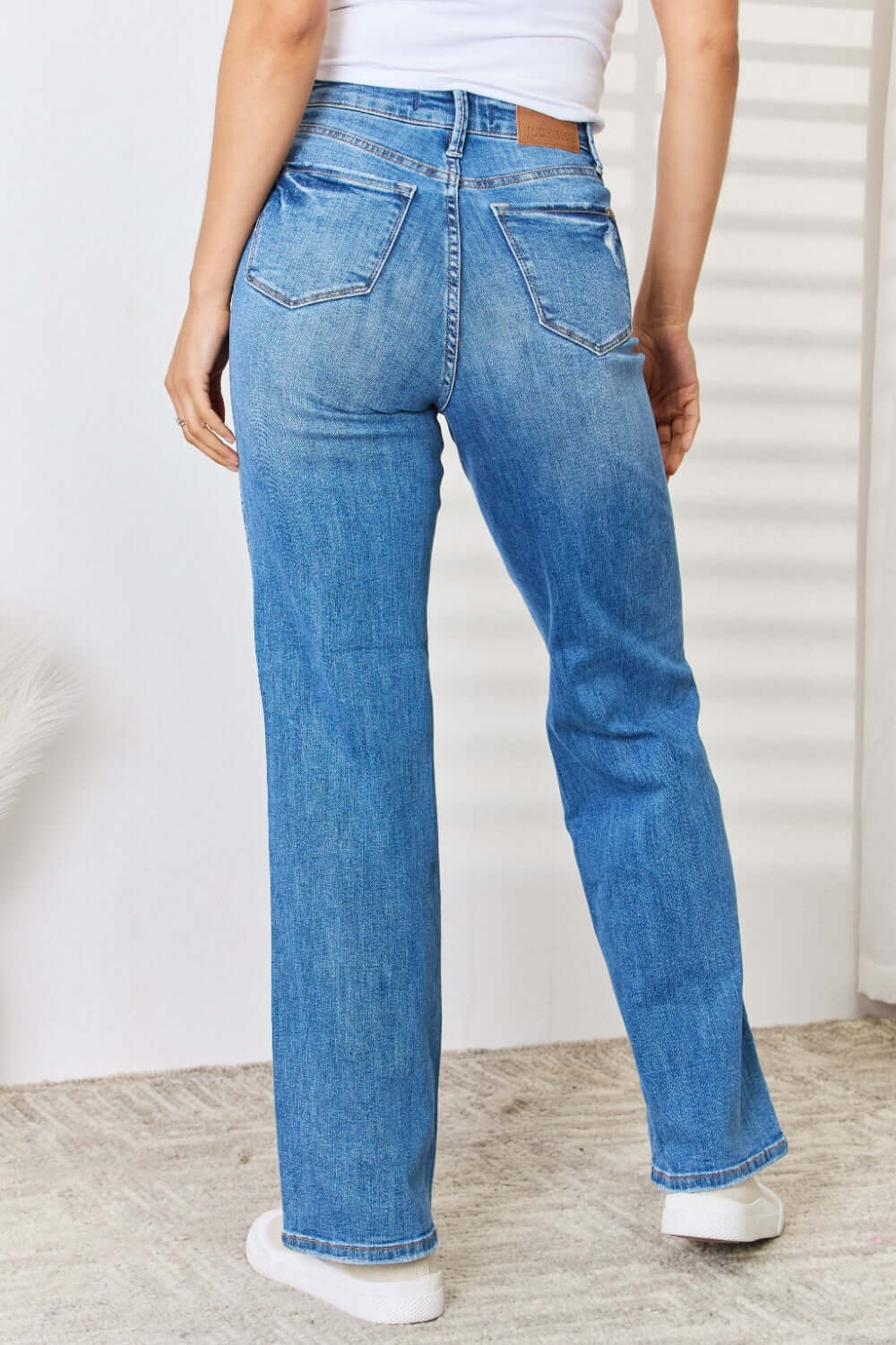 High Waist Distressed Straight-Leg Jeans by Judy Blue in light blue denim, back view showing flattering fit and trendy distressed details