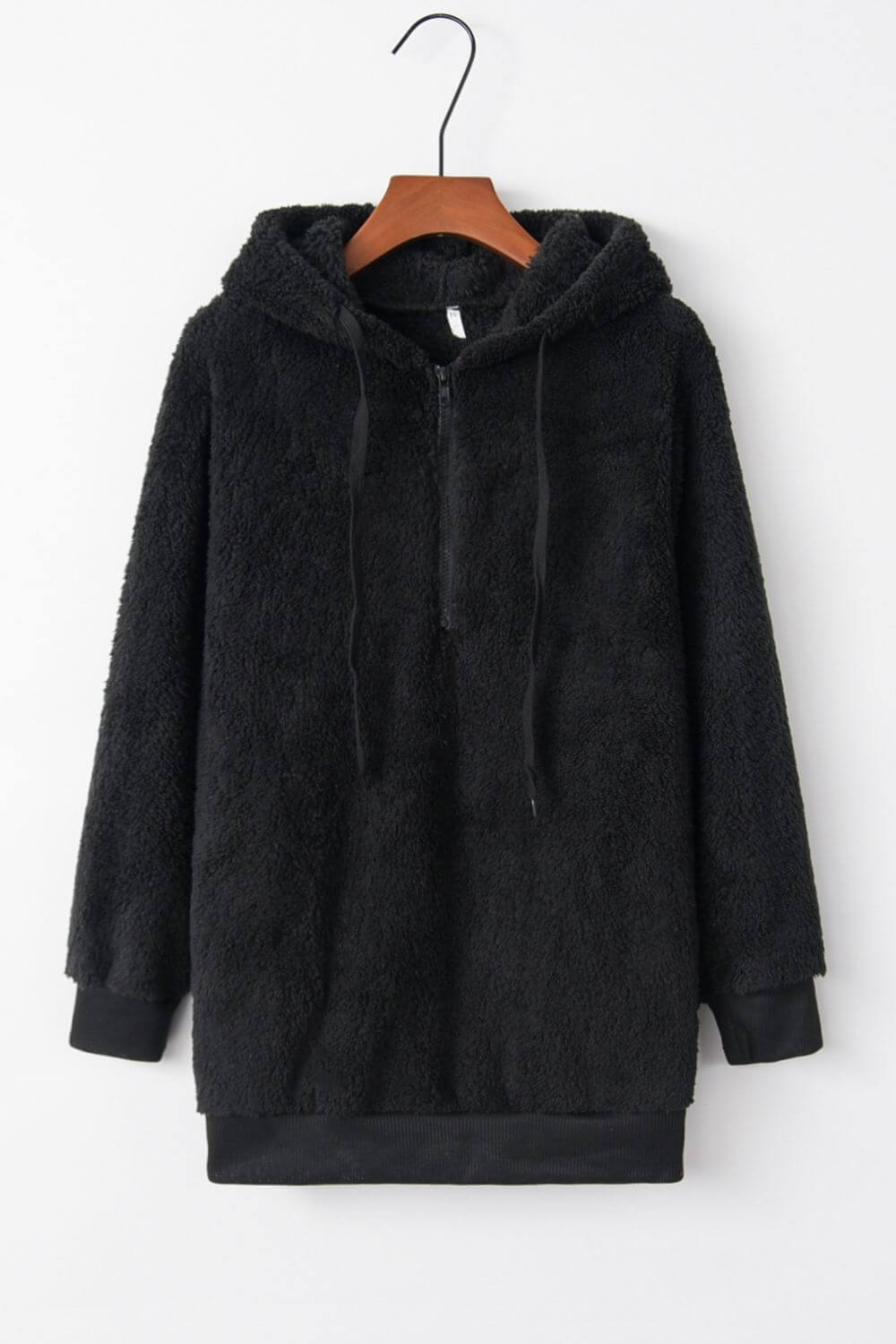 Cozy black teddy hoodie with quarter-zip and drawstring, perfect for chilly days and casual style.