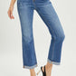 Stylish Risen Button-Fly Cropped Bootcut Jeans showcasing chic button fly closure and cropped length, perfect for flaunting your favorite shoes.