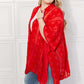 JUSTIN TAYLOR Pom-Pom Asymmetrical Poncho Cardigan in Red at Bella Road