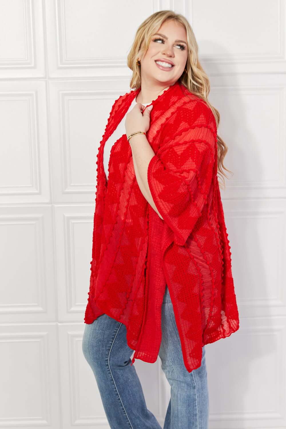 JUSTIN TAYLOR Pom-Pom Asymmetrical Poncho Cardigan in Red at Bella Road