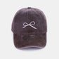 Bow Embroidered Washed Cotton Cap with delicate bow design in brown color for a stylish and comfortable accessory.