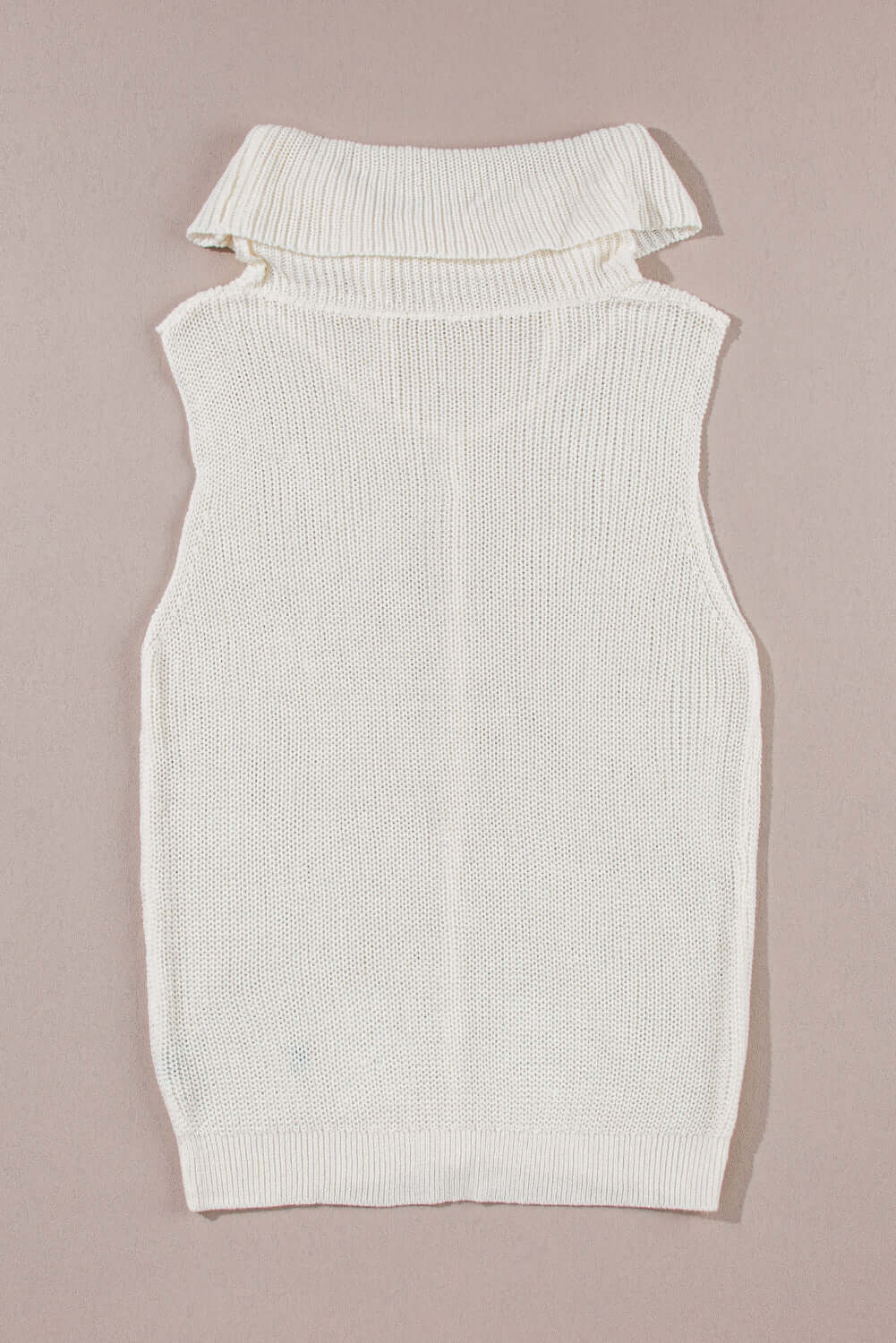 Bella Road sleeveless turtleneck sweater vest in white with central seam, perfect for layering and cozy outfits.