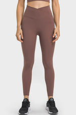 Millennia V-Waist Yoga Leggings in brown, featuring a stylish design and pocket for essentials, perfect for yoga practice.