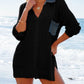 Stylish openwork black swim cover-up with collared neck and side slit at the beach, perfect for summer outings.