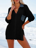 Stylish openwork black swim cover-up with collared neck and side slit at the beach, perfect for summer outings.