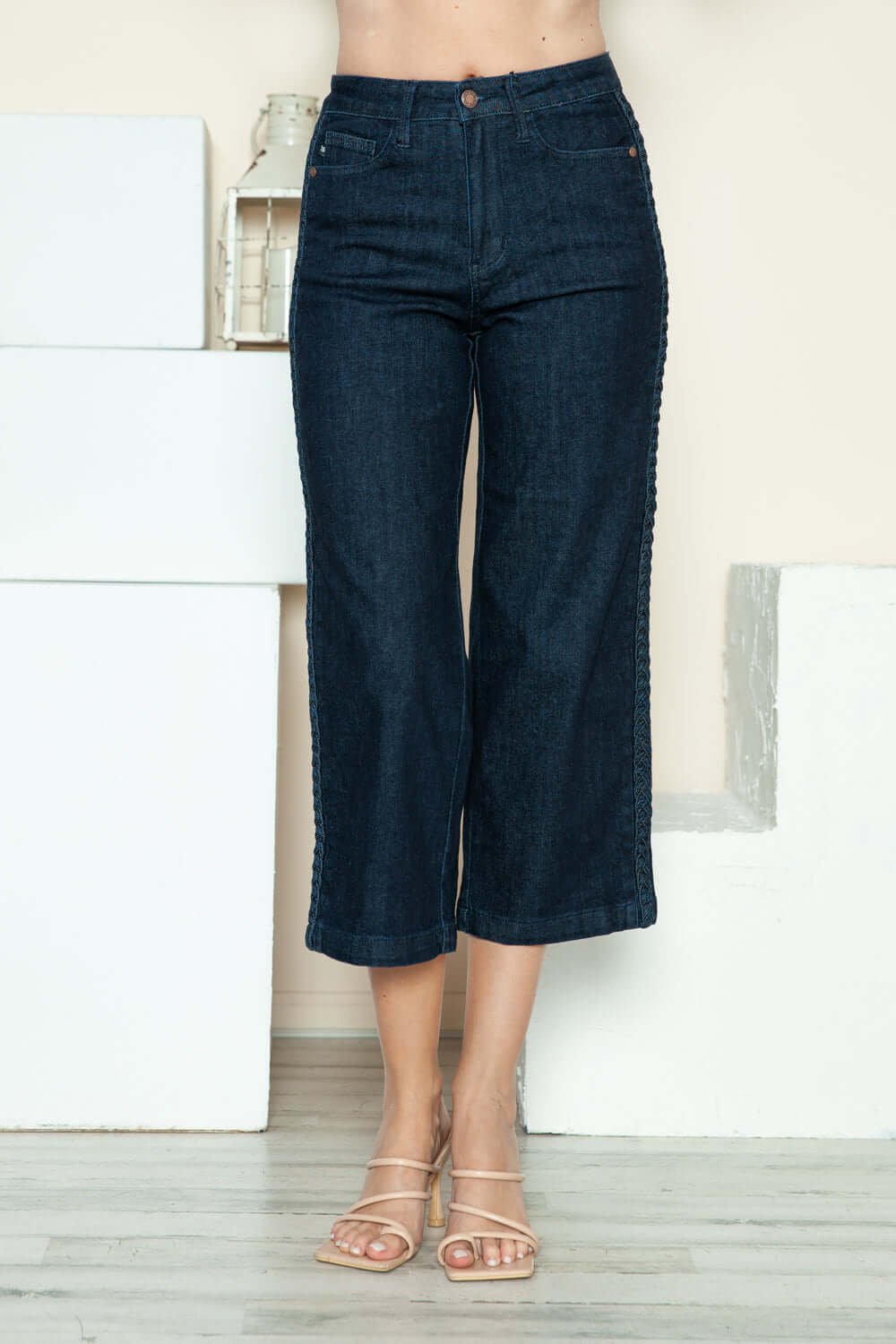 Judy Blue side seam braid crop wide leg jeans with unique detailing and relaxed fit, perfect for a stylish and comfortable look.