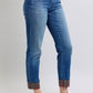 Judy Blue plaid cuff straight leg jeans, mid waist, featuring stylish pockets and a trendy look with white sneakers.