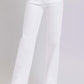 Woman wearing white high waist straight jeans with a flattering silhouette, slightly stretchy and pocketed, by Risen Jeans.