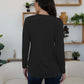 Woman wearing FAM-FAM Round Neck Long Sleeve T-Shirt in black, perfect for casual style, back view.