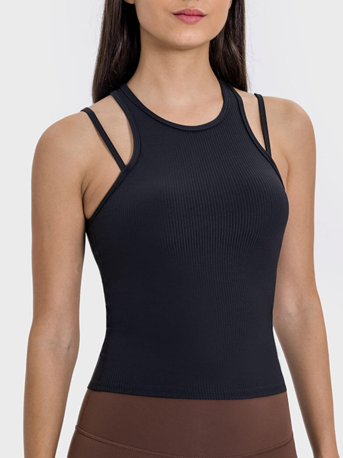 Millennia Cutout Round Neck Racerback Active Tank in black, showcasing unique cutout design and comfortable fit for workouts.