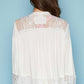 Open front lace detail cardigan with frayed edges and 3/4 length bell sleeves in white, displayed from the back on a model