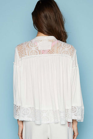 Open front lace detail cardigan with frayed edges and 3/4 length bell sleeves in white, displayed from the back on a model