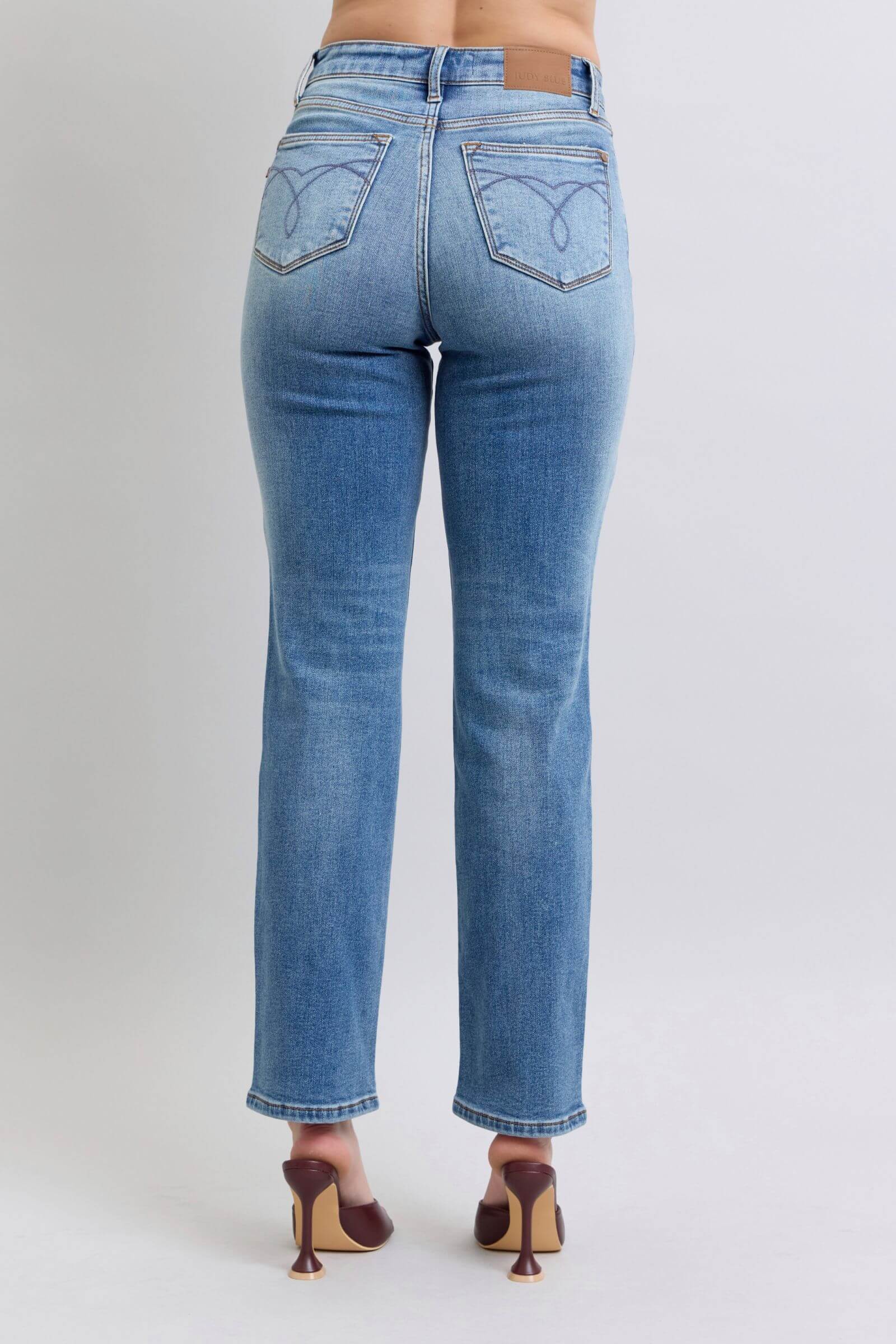 Back view of Judy Blue vintage wash thermal straight jeans showcasing classic style and functional pockets.