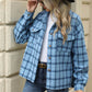 Woman wearing Bella Road Plaid Collared Neck Long Sleeve Jacket with jeans and black hat holding a coffee cup