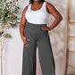 DOUBLE TAKE Full Size Smocked Wide Waistband Wide Leg Pants at Bella Road