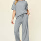 DOUBLE TAKE Full Size Texture Round Neck Short Sleeve T-Shirt and Wide Leg Pants at Bella Road